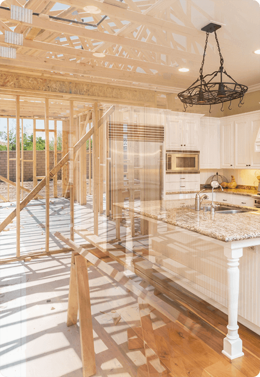 A partially constructed house with the framing visible, overlaid with a transparent image of a completed kitchen, symbolizing the transition from the building phase to a finished dream home.