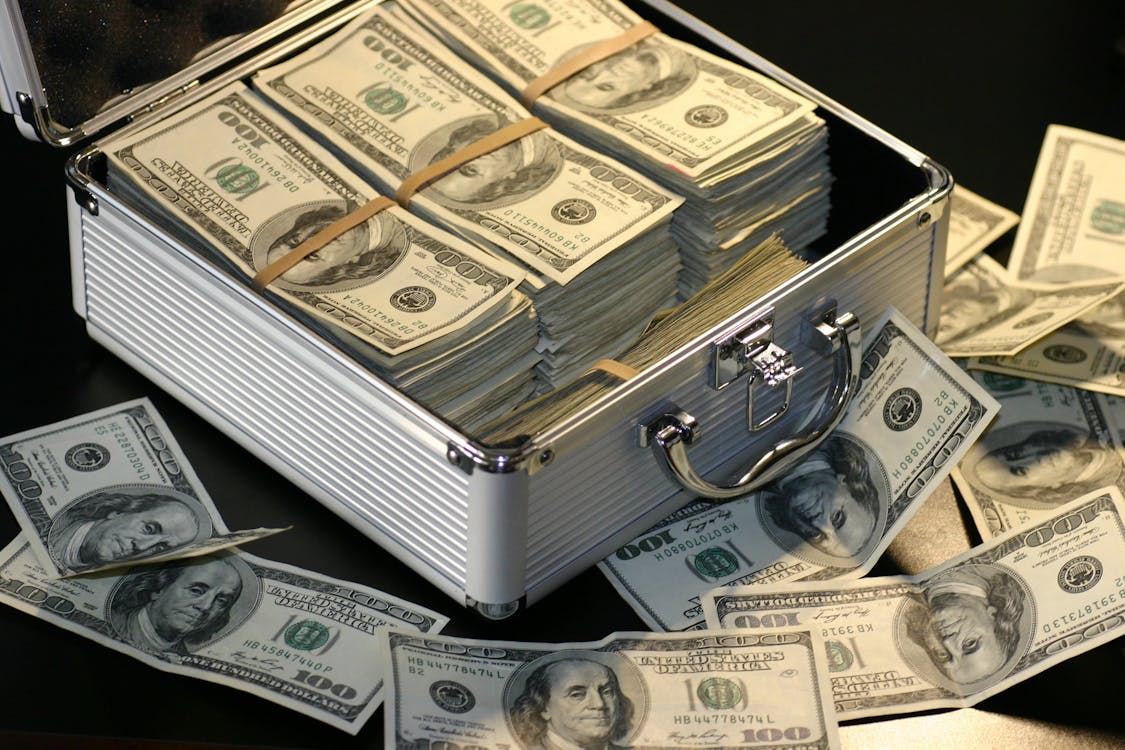 100 dollar notes in a briefcase