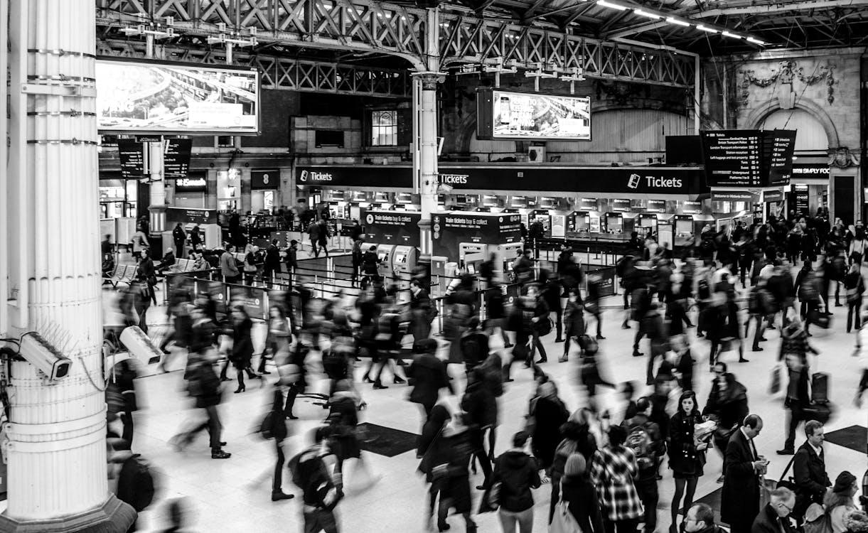 A black-and-white image of a crowded area